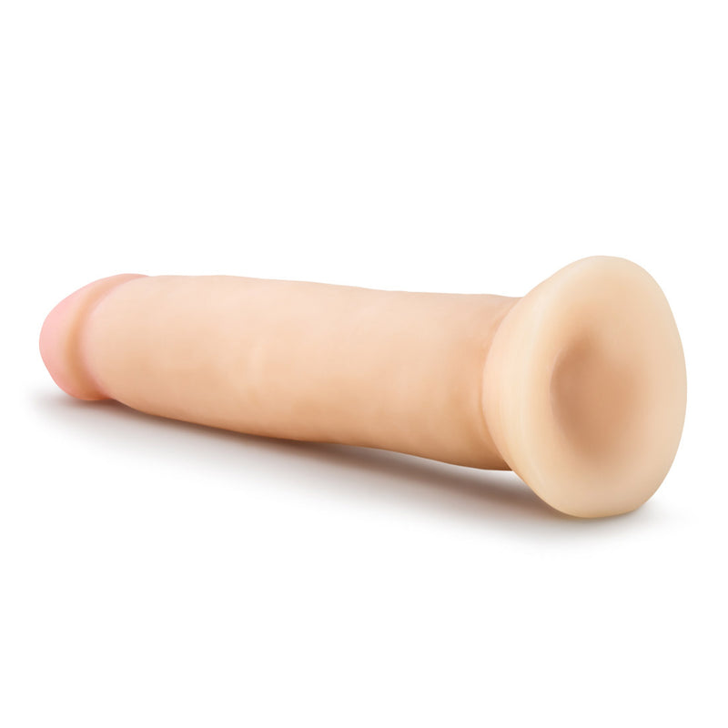 Get Ready to Be Satisfied with the Au Naturel 9.5 Inch Magnum Dong - Realistic Feel, Posable Shaft, Suction Cup Base, and Harness-Compatible!