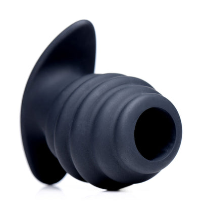 Ribbed Hollow Silicone Butt Plug with Tunnel Core for Endless Pleasure and Comfortable Wear.