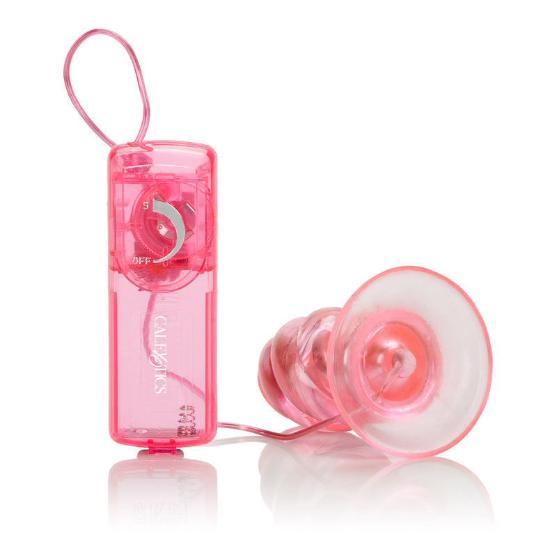 Designer Twist Vibrating Butt Plug with Suction Cup Base and Multi-Speed Feature for Hands-Free Pleasure.