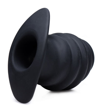 Ribbed Hollow Silicone Butt Plug with Tunnel Core for Endless Pleasure and Comfortable Wear.