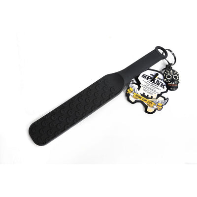 Spank: Soft Silicone Paddle with Edgy Skull Design for Playful Fun